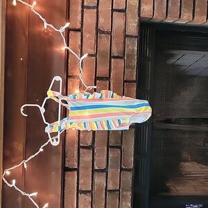 NWOT Wonder Nation girls swim suit. Size 5t Colors yellow blue and pink.